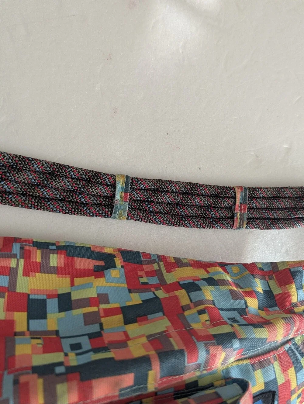 Kavu Multicolor Geo Pixel Sling Bag - Red Blue Yellow Green
